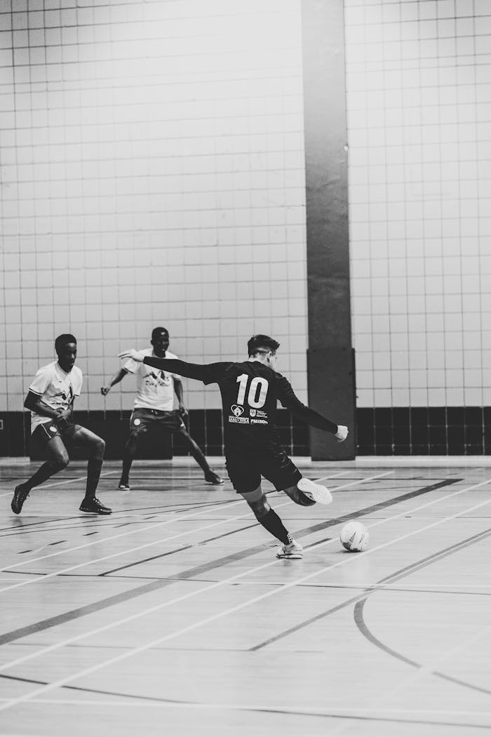 Intense indoor soccer action with players in motion, Gatineau, QC